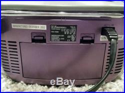 Emerson portable stereo in Purple with CD and tape player and AM FM stereo